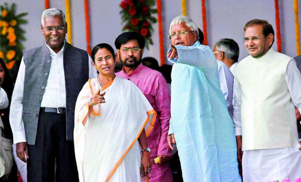 Lalu’s 2 sons in Nitish cabinet; anti-BJP leaders throng swearing-in event in Patna